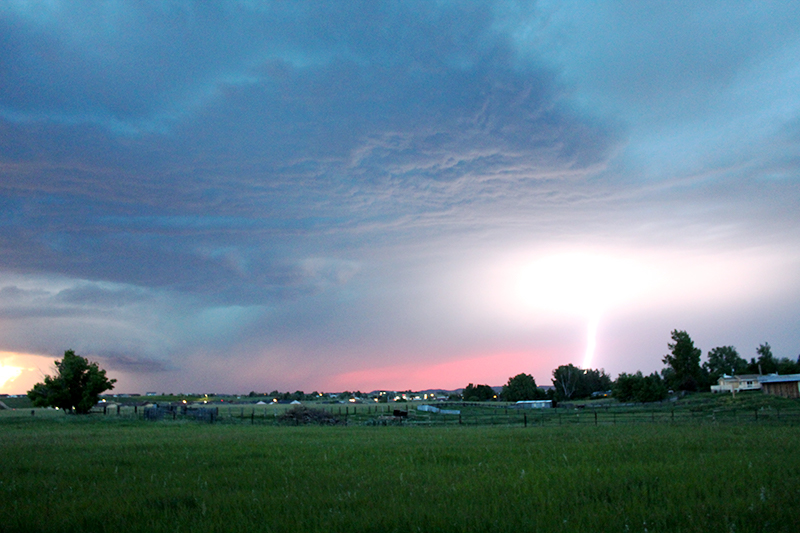 lightning illuminating the sky in a bright flash