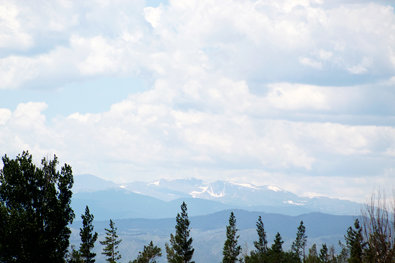 landscape image of the rocky mountains and cloud cover 